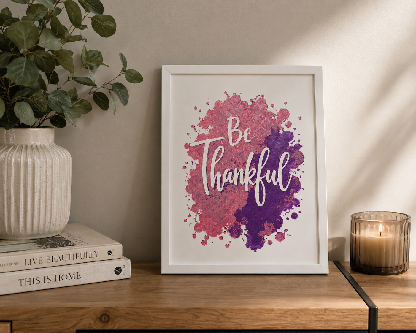 Be Thankful pink and purple 8x10 framed wall art displayed on a wooden console