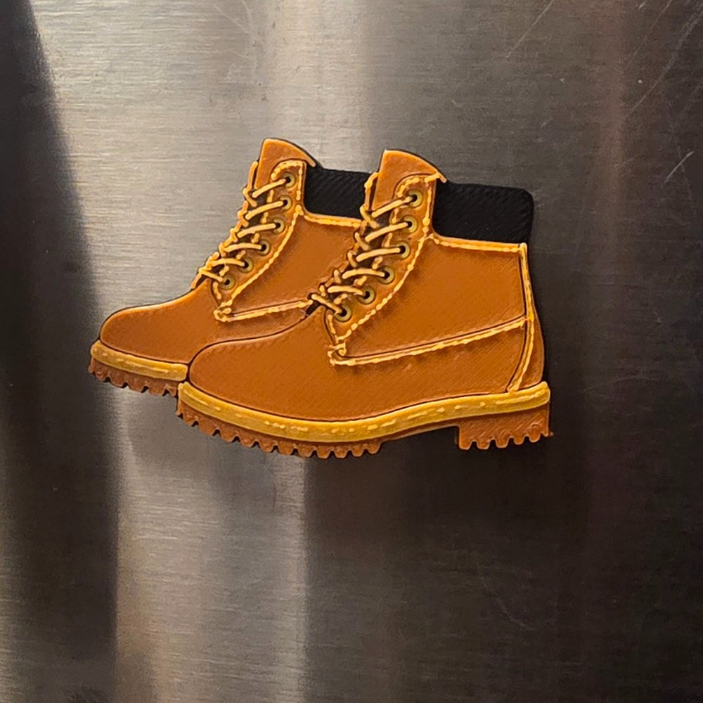 Close-up of Boots 3D printed refrigerator magnet showing raised details
